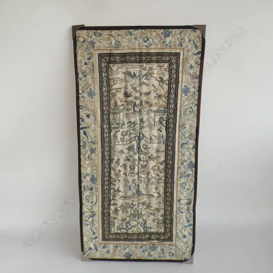 A framed panel of embroidered Chinese fabric
